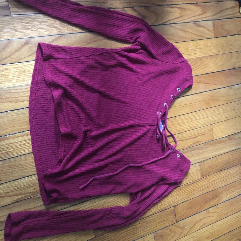 maroon v neck shirt